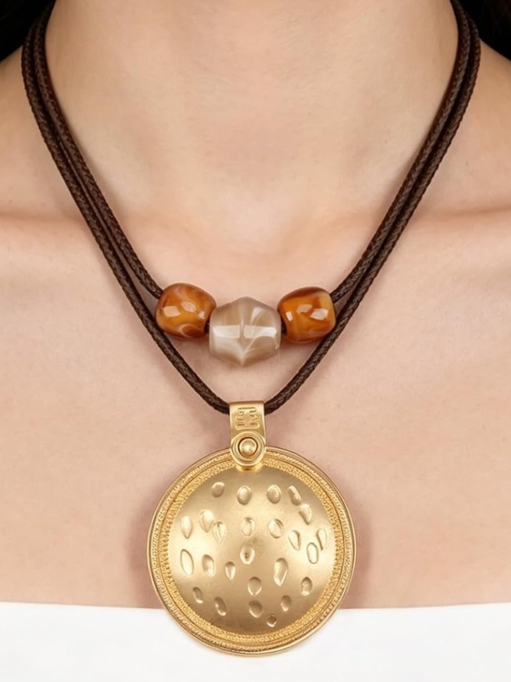 Anthropologie Gold-Tone Disc Pendant Necklace with Brown Cord and Amber Beads